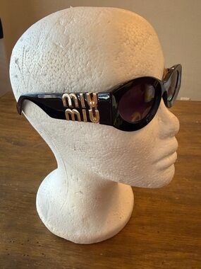 Miu Miu Black Cat-Eye Sunglasses with Gold Logo Temples